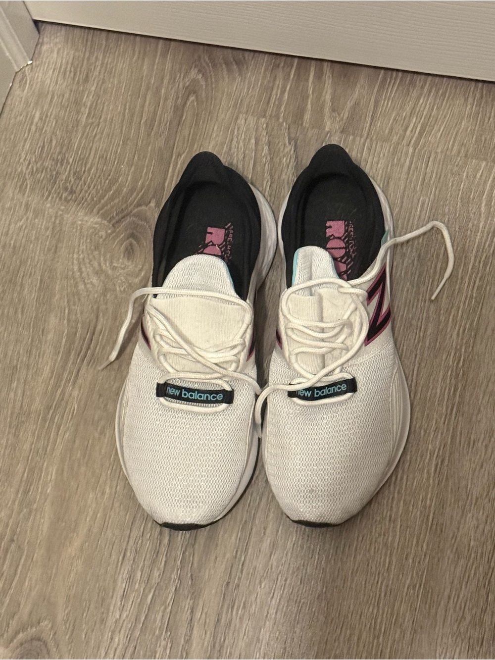 New Balance Women’s White Athletic Sneakers with Pink Accents